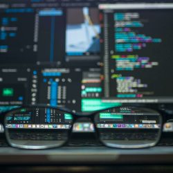 Glasses in front of a laptop screen